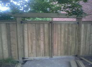 residential wood fence entrance